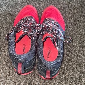 Red and Black New Balance Tennis Shoes